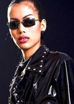 Tight Ladyboy Karn asshole teases by a giant yellow dildo